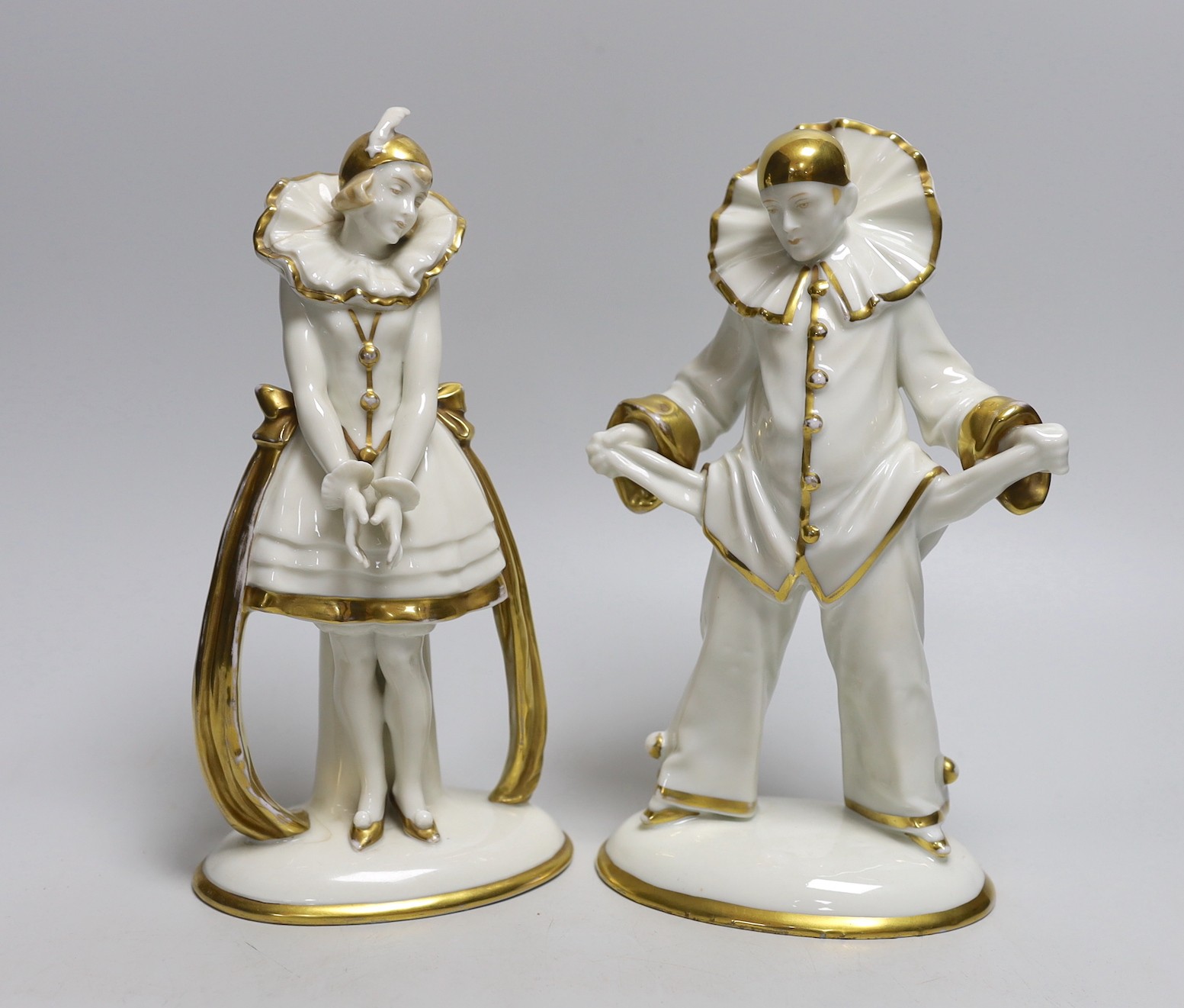 A pair of Sitzendorf Art Deco Pierrot figures, tallest 23cms high